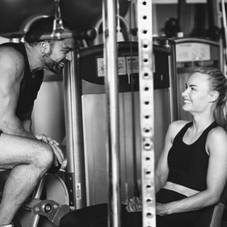 Emlyn speaking with a client during a training session